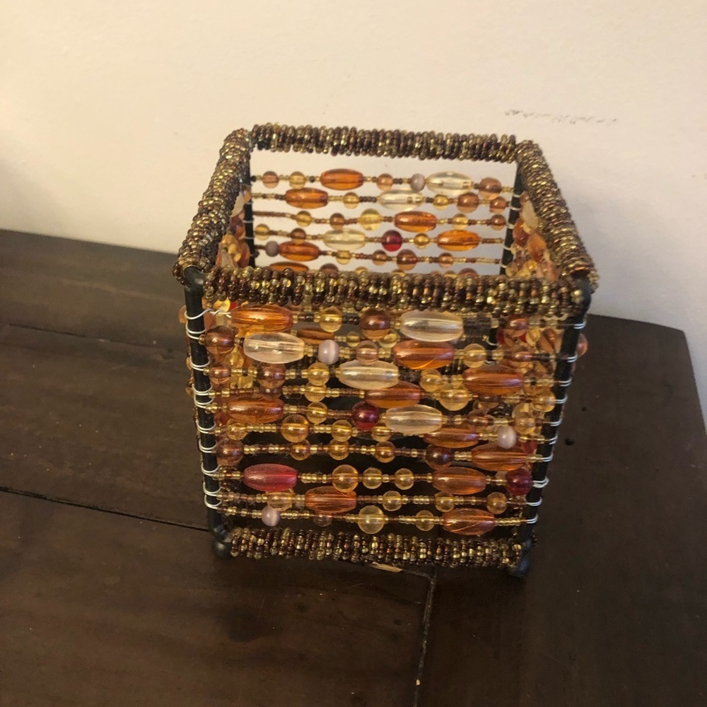 Beaded tea light holder